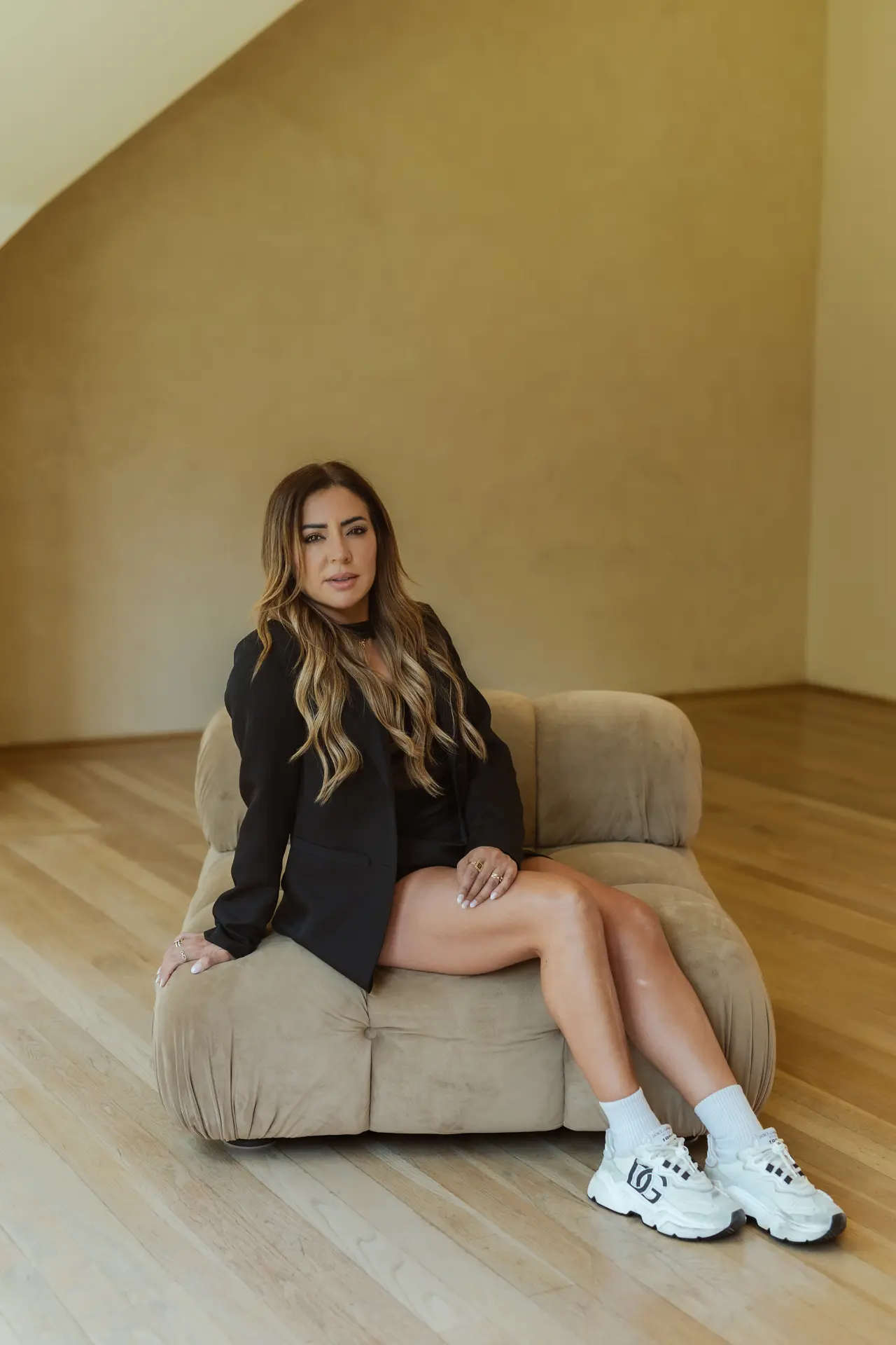 Lila, Elevae co-founder, in an ivory blazer
